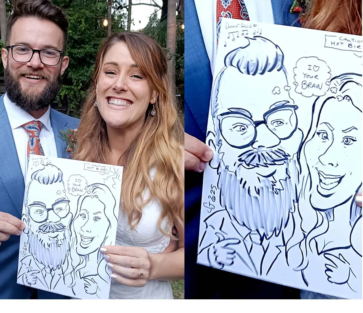Bride and groom smiling and holding up the live caricature Sam drew of them